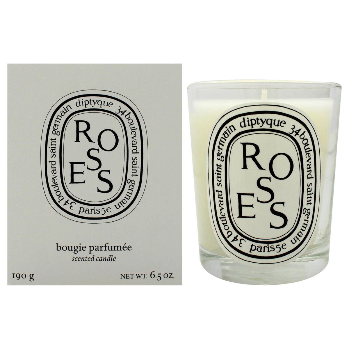 Diptyque Roses scented candle in a clear glass jar next to its light gray packaging box, both featuring the black and white circular 'ROSES' logo.